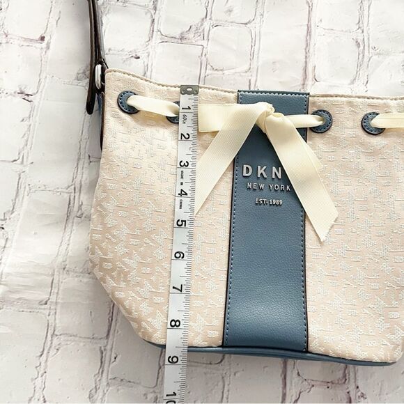 DKNY Ivory Cream and Blue Trims Lace Bow Front Bucket Style Crossbody Purse Bag - Picture 7 of 14